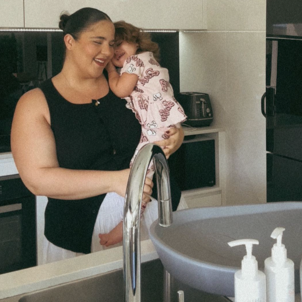 mum washing childs hair